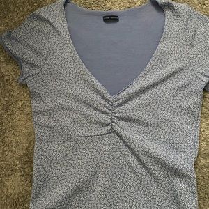 blue cinched shirt with flowers